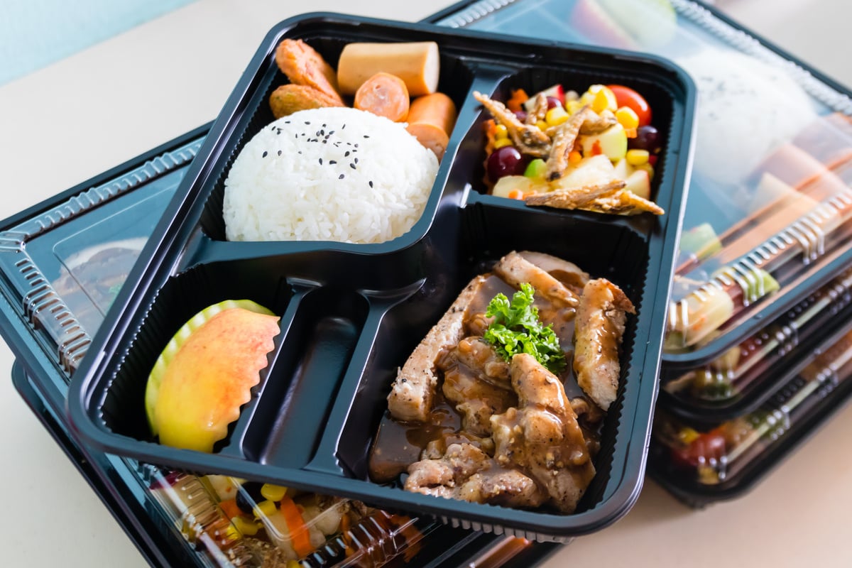 Thai lunch boxes in plastic packages.